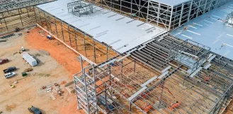 Aerial view of a structural steel building frame under construction in Illinois