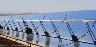 Rows of solar collectors at a utility installation - utility fabrication in Illinois