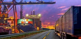 Container ship and truck at a shipping port - maritime fabrication in Illinois