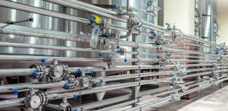 Stainless steel process piping and valves on industrial capital equipment in Illinois