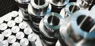 Rows of precision machined steel and aluminum production parts in Illinois